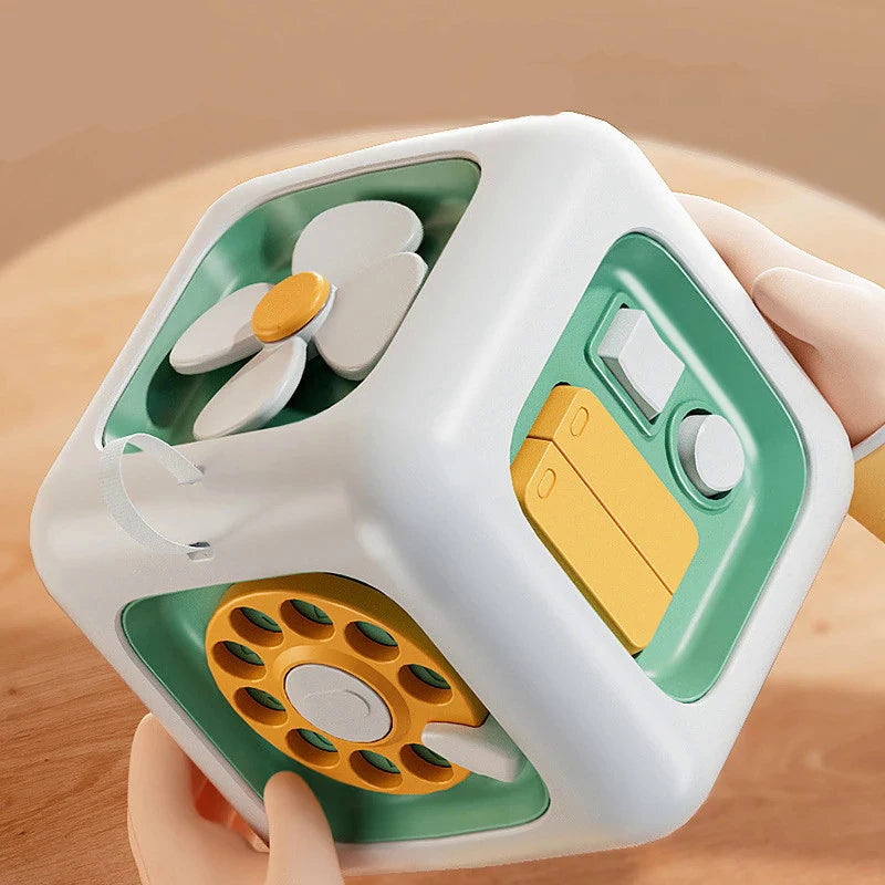 Cubo Montessori 6 em 1 – Brinquedo Educativo Sensorial para Habilidades Motoras de Bebês